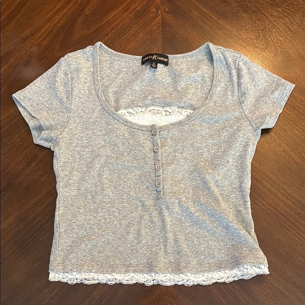 Almost Famous Gray cropped tight fit top with lace rims and buttons Size Small